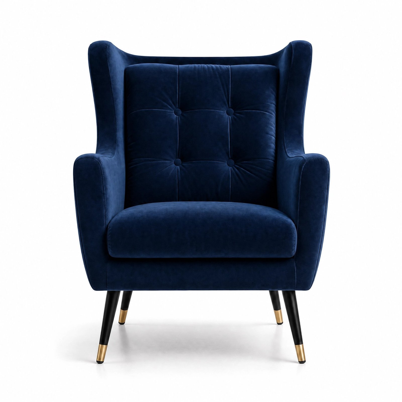 Bango velvet wing chair in navy blue with tufted back and brass-tipped legs